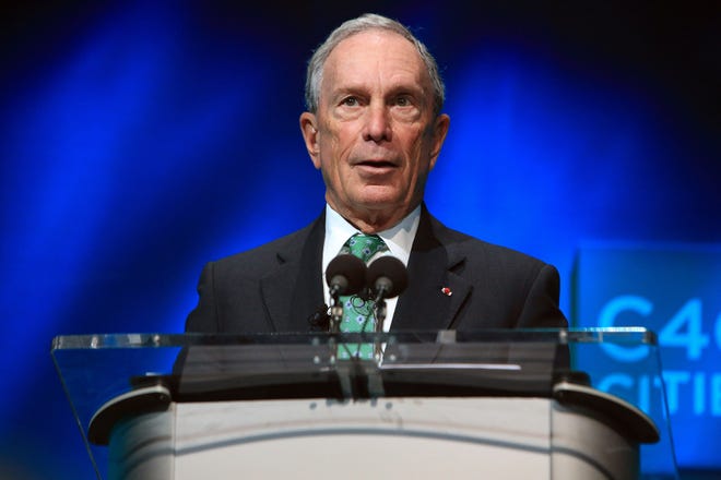 FILE - In this Dec. 3, 2015, file photo, former New York Mayor Michael Bloomberg speaks during the C40 cities awards ceremony, in Paris. Bloomberg, the billionaire former three-term mayor of New York City, has decided against mounting a third-party White House bid in 2016. (AP Photo/Thibault Camus, File) ORG XMIT: WX111