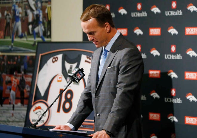 Denver Broncos quarterback Peyton Manning struggles to speak during his retirement announcement at team headquarters Monday in Englewood, Colo. (AP Photo/David Zalubowski)