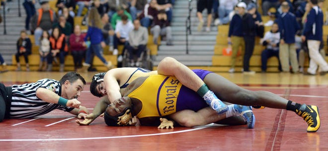 Council Rock South's Joe Doyle, top, has the upper hand just before pinning Upper Darby's Brian Kennerly in the 195-pound match during the Southeast Regional Class AAA wrestling championships at Souderton High School Saturday March 5, 2016 in Franconia, Pennsylvania. (Photo by William Thomas Cain)