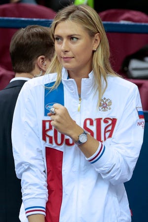 In this Saturday, Feb. 6, 2016, file photo, Russia's Maria Sharapova reacts during the Fed Cup tennis match between Russia and Netherlands in Moscow, Russia.