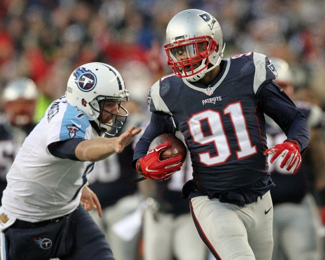 Jamie Collins returns an interception in the fourth quarter against Tennessee on Dec. 20.
