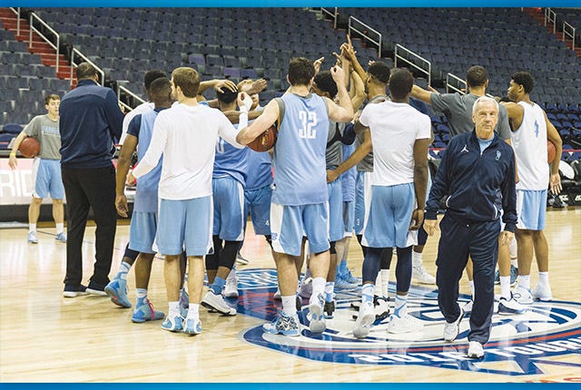 North Carolina Tar Heels head coach Roy Williams walks away from a team huddle near the end of their practice session before the second round of the 2016 ACC Men's Basketball Conference tournament at the Verizon Center in Washington D.C. on March 9, 2016. PJ Ward-Brown/The Courier-Tribune