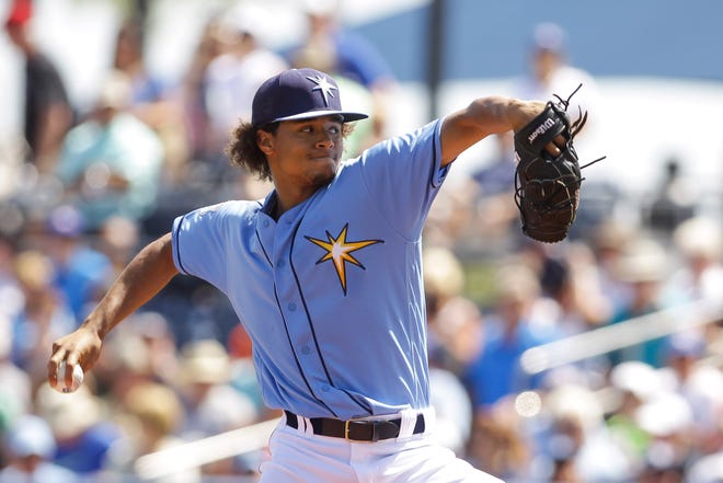 Tampa Bay Rays pitcher Chris Archer (22) delivers in the first inning against the Toronto Blue Jays in Port Charlotte on Wednesday.