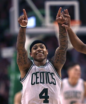 Celtics guard Isaiah Thomas celebrates after hitting a 3-point shot during the second half of Boston's 116-96 win over the Grizzlies on Wednesday night at TD Garden.