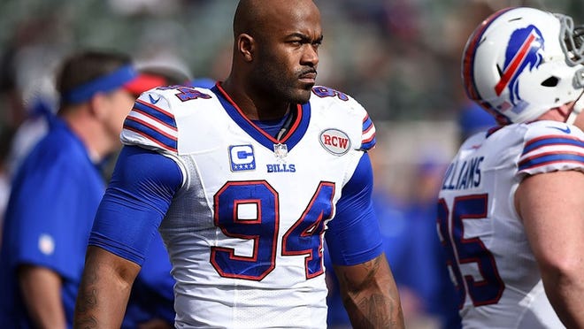 OAKLAND, CA - DECEMBER 21: Mario Williams #94 of the Buffalo Bills walks on the sidelines during pregame against the Oakland Raiders at O.co Coliseum on December 21, 2014 in Oakland, California. (Photo by Thearon W. Henderson/Getty Images)