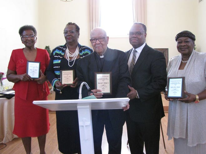 Honorees for community contribution are, from left, Mary Anne Rich, Evelyn Foxx, Bishop James E. McKnight Sr., accompanied by his son, Bishop James E. McKnight Jr., and LaVern Porter-Mitchell.