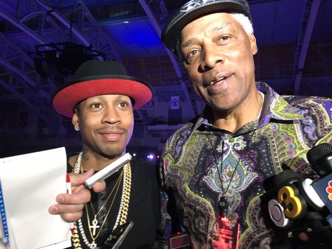 Former Sixers greats Allen Iverson (left) and Julius "Dr. J" Erving share a smile Thursday night at The Palestra.