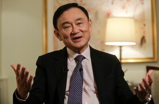 Thailand's former Prime Minister Thaksin Shinawatra responds to questions during a news interview Wednesday, March 9, 2016, in New York. (AP Photo/Frank Franklin II)