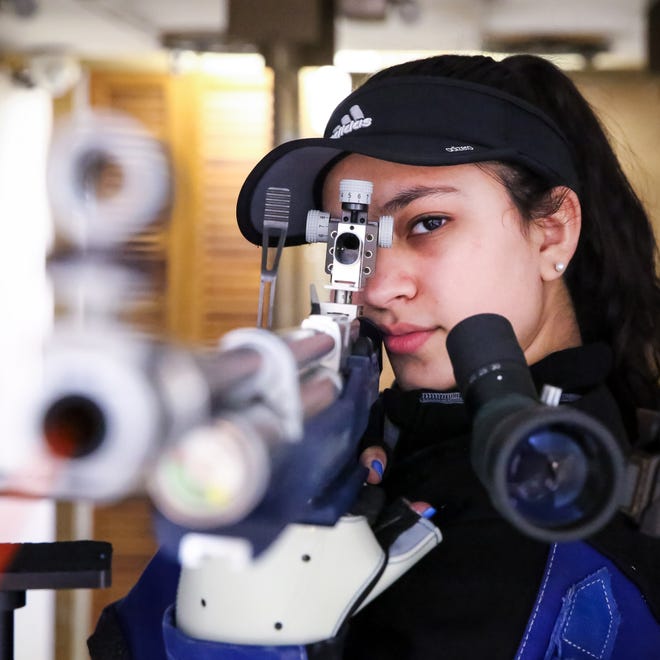 Aliya Butt, of Franklin, takes aim during air rifle practice at Maspenock Rod and Gun Club in Milford on Tuesday. Butt, along with 3 other teammates have qualifies for the Junior Olympics in Colorado. Daily News and Wicked Local Photo/Dan Holmes