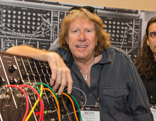 FILE - In this Jan. 23, 2015 file photo, Keith Emerson attends the 2015 National Association of Music Merchants (NAMM) show in Anaheim, Calif. Emerson, the keyboardist and founding member of the 1970s progressive rock group Emerson, Lake and Palmer, died Thursday, March 10, 2016, at home in Santa Monica, Calif. He was 71. (Photo by Paul A. Hebert/Invision/AP, File)