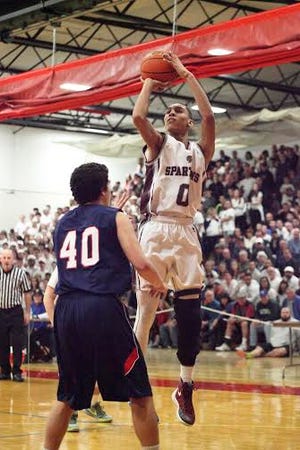 Brycen Goodine of Bishop Stang pulls up for a jumper during Saturday's playoff win over Apponequet.