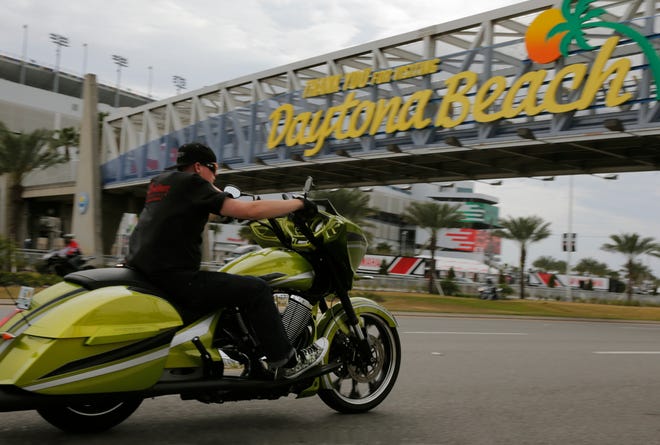 A biker heads west Sunday on International Speedway Boulevard in Daytona Beach as the 75th annual Bike Week came to a close and thousands of visitors headed home. News-Journal/NIGEL COOK