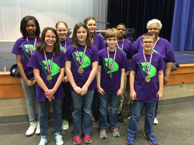 Shelby Middle School Battle of the Books participants : (Bottom row)Madison Biddix, Nicole Camp, Logan Haskin, Luke Parker; (top row) Bailey Strickland, Heather White, Chloe Whisnant, Chris Daniels, and coach Linda Lockhart.