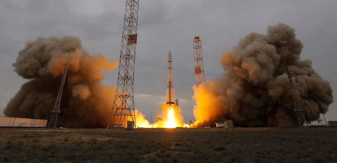 The Proton-M rocket booster blasts off at the Russian leased Baikonur cosmodrome, Kazakhstan, Monday, March 14, 2016. Europe and Russia launched a joint mission Monday to explore the atmosphere of Mars and hunt for signs of life on the red planet. The unmanned ExoMars probe, a collaboration between the European Space Agency and Roscosmos, took off aboard a Russian rocket and is expected to reach Mars in October. (AP Photo/Dmitri Lovetsky)