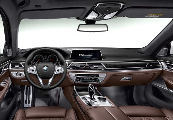 BMW 7-Series cabins are now as luxurious and high-fashion as the best from Audi, M-B and Porsche. The iDrive knob (alongside the shifter) and the touchscreen manage most of the car’s many functions, but the basics—radio, phone, climate control, wipers, trip meter, seats—can be controlled via manual switches. (BMW)