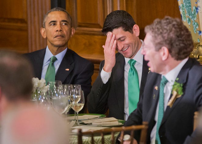 President Barack Obama, left, and House Speaker Paul Ryan of Wis., right, listen to Irish Prime Minister Enda Kenny, speak during a lunch celebrating St. Patrick's Day on Capitol Hill in Washington, Tuesday, March 15, 2016. (AP Photo/Pablo Martinez Monsivais)