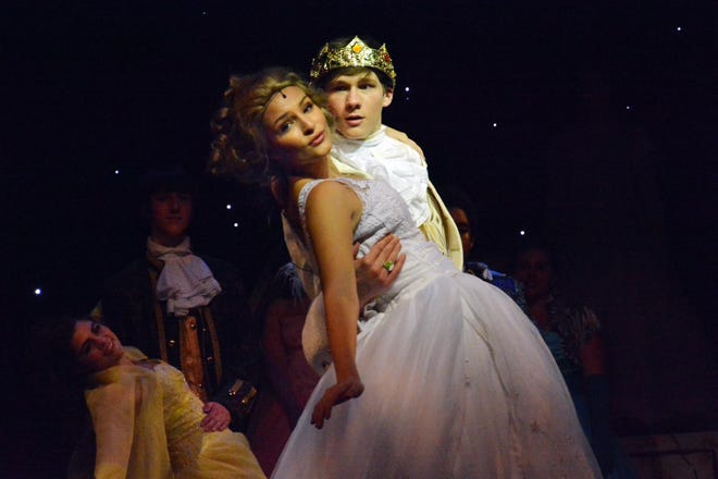 The prince (Jacob Kovitz) dances with Cinderella (Hannah Kroh) at the ball.