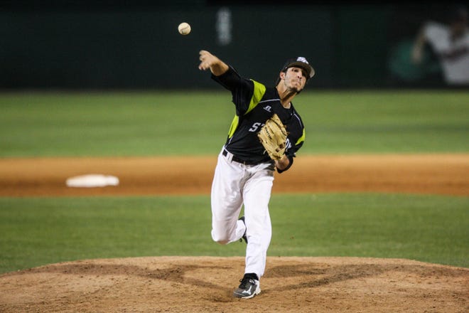 Joey Gonzalez pitches for Stetson against USF at Stetson in Deland on Tuesday. News-Journal/LOLA GOMEZ