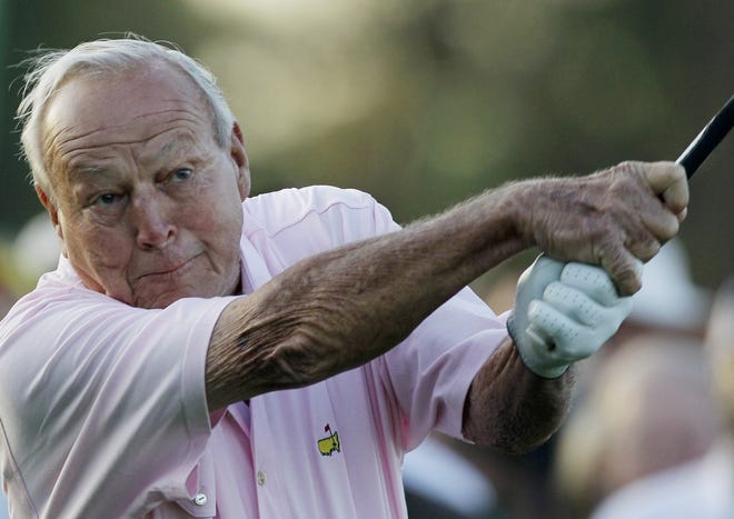 Arnie grew old, but never grew timid with the driver in his hands. 
 AP FILE