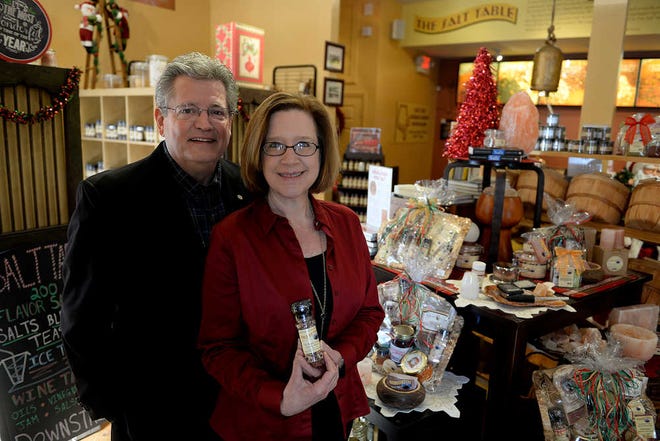 Brittney Lohmiller / Savannah Morning News - Dave, left, and Carol Legasse opened The Salt Table a gourmet seasonings store in Savannah in 2011. The Salt Table in the 2014 retail business of the year.