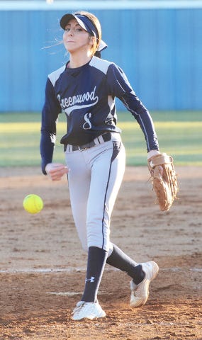 BRIAN D. SANDERFORD • TIMES RECORD Greenwood pitcher Victoria Taylor works in the fourth inning against Heritage on Tuesday in Greenwood. Taylor pitched her second perfect game in two days.