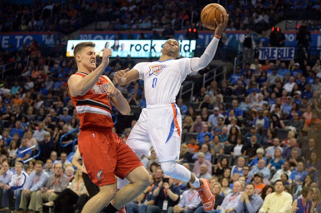 Oklahoma City Thunder guard Russell Westbrook (0) drives to the basket against Portland Trail Blazers forward Meyers Leonard (11) during the third quarter at Chesapeake Energy Arena in Oklahoma City on Monday, March 14, 2016. (Mark D. Smith-USA TODAY Sports) 
 Oklahoma City Thunder forward Serge Ibaka (9) blocks a shot attempt by Portland Trail Blazers center Mason Plumlee (24) during the first quarter at Chesapeake Energy Arena in Oklahoma City on Monday, March 14, 2016. (Mark D. Smith-USA TODAY Sports) 
 Oklahoma City Thunder forward Kevin Durant (35) drives to the basket while pursued by Portland Trail Blazers forward Al-Farouq Aminu (8) during the third quarter at Chesapeake Energy Arena in Oklahoma City on Monday, March 14, 2016. (Mark D. Smith-USA TODAY Sports)