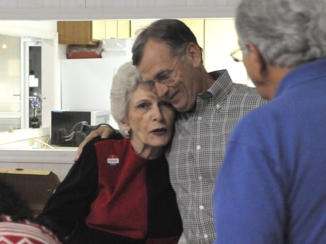 Brunswick County Board of Education member Shirley Babson is embraced by state Sen. Bill Rabon, R-Brunswick, at the Brunswick County Republican headquarters on Nov. 4, 2014. STARNEWS FILE PHOTO