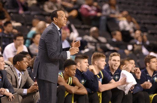 UNC Wilmington coach Kevin Keatts talks to his team during last week's win against Hofstra in the CAA final.