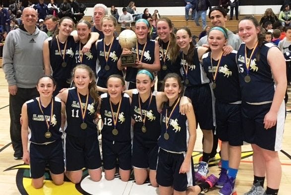 The Saint Andrew girls varsity region basketball team won the Philadephia Archdiocesan CYO basketball title and came in third at the state CYO tournament. Team members include: (front row, from left) Juliana Shouldis, Sarah McDermott, Mary Baniewicz, Mia Spinelli and Jillian Hopkins. In the second row are coach Mike D’Aulerio, Cassidy Mahle, Mariah McDonald, Kelly Kowalick, Lauren Vesey, Abigail Jones, Maria D’Aulerio, Jackie Skalski, and Katie McGinn. In back are head coach Mike Barrett and coach Brian Spinelli.