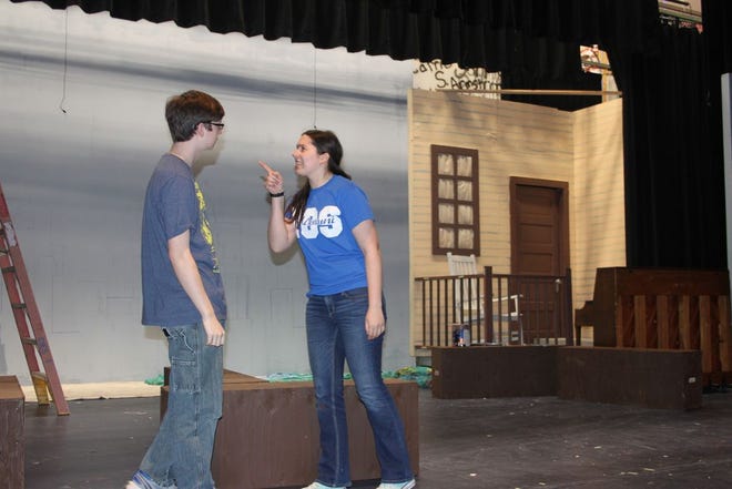 Cecilia Fasano and Will Best, both Monmouth-Roseville High School seniors, run lines Wednesday afternoon for a scene in the upcoming play, "Music Man." Performances will be Friday and Saturday at 7 p.m. and Sunday at 2 p.m.