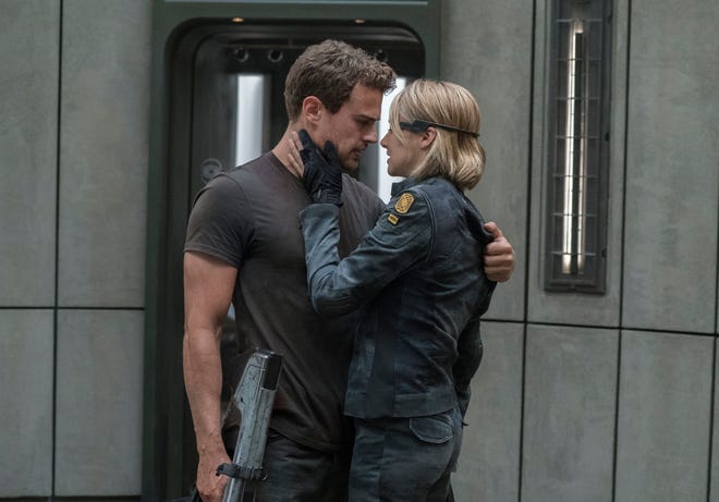 This image released by Lionsgate shows Shailene Woodley, right, and Theo James in a scene from "The Divergent Series: Allegiant." (Murray Close/Lionsgate via AP)