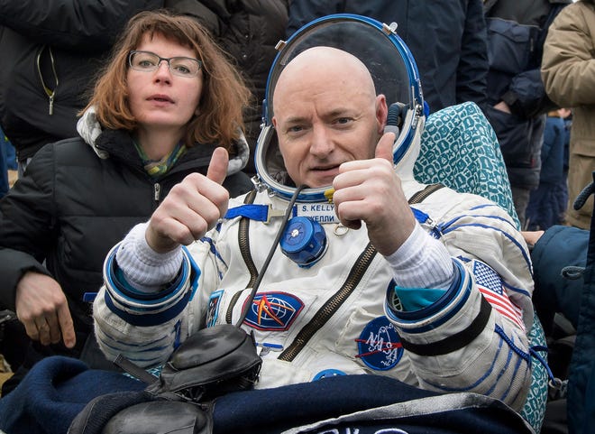 FILE - In this Wednesday, March 2, 2016, file photo provided by NASA, International Space Station (ISS) crew member Scott Kelly of the U.S. reacts after landing near the town of Dzhezkazgan, Kazakhstan. Kelly is exploring lots of options for the next step in his life. But he's saving the serious job discussions for retirement, coming up April 1. (Bill Ingalls/NASA via AP, File)