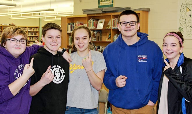 North Hampton School eighth graders celebrate the winning of the 2nd annual What's So Cool About Manufacturing? video contest. From left, Kayleigh Smith, Maddie King, Jade Goulet, Keith Albergoand Anne Carrigg, worked with Foss Manufacturing to produce the video about advanced manufacturing.