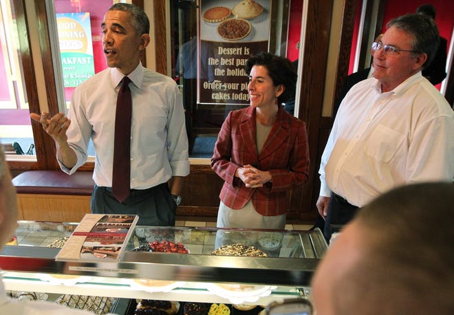 President Obama visited Gregg's Restaurant on North Main Street in Providence in October, 2014. He ordered a cheeseburger and a "Death by Chocolate" cake, with Gina Raimondo, then a candidate for Rhode Island governor, at his side. At right is Bob Bacon, who owns Gregg's with wife Bobbie. 

The Providence Journal, file / Bob Breidenbach