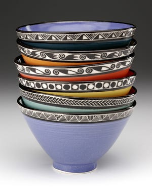 James Guggina's line of hand-thrown porcelain Majolica dinnerware will be available at the Paradise City Arts Festivals. Promotional Photo