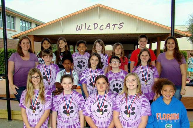 Chisholm Elementary coaches Elizabeth Ditslear (left) and Julie Reheiser stand with their third to fifth grade students who competed in the Odyssey of the Mind Regional Tournament at the Magic Center in Orlando. The school's fifth grade team took first place and will compete in the state tournament at the University of Central Florida on Saturday, April 9.