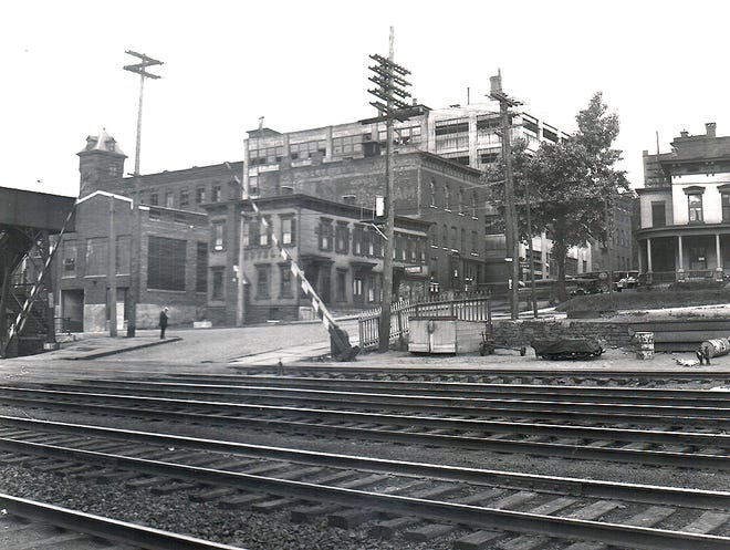 This early 20th century photo of the South Ann Street railroad crossing and the Cherry-Burrell factory building on the corner of Albany and South Ann streets was taken by Little Falls photographer Fred Abbott. PHOTO COURTESY/LITTLE FALLS HISTORICAL SOCIETY