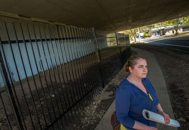 Shanalea Forrest plans to organize a protest against newly installed fencing placed beneath Eugene’s Interstate 105, an area frequented by the homeless. (Brian Davies/The Register-Guard)