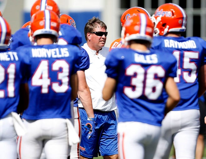 Florida coach Jim McElwain watches practice Wednesday.