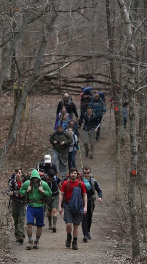 (Photo Mike Hensdill/The Gaston Gazette ) Crowders Mountain State Park has quickly become one of the area's favorite attraction with hundreds of thousands of people visiting the park last year. Here, a group of scouts from Charlotte makes their way along the Pinnacle Trail early Saturday morning, February 20, 2016.