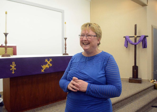 The Rev. Lisa Anderson, pastor of St. John Lutheran Church, stands in the sanctuary of the congregation’s new church at 190 Wauregan Road in Danielson. The church sold its church building in Brooklyn and will hold its first worship service in its new home on Palm Sunday.

John Shishmanian/ NorwichBulletin.com