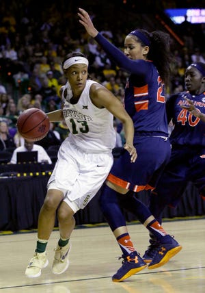 Baylor forward Nina Davis (13) drives against Auburn defenders Jessica Jones (23) and Khady Dieng (40) during the first half of a second-round women's college basketball game in the NCAA Tournament Sunday, March 20, 2016, in Waco, Texas. (AP Photo/LM Otero)