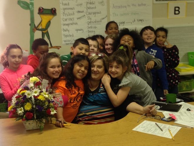 Special to The Star

Jeannie Brittain and her class at Washington Elementary. Brittain, who has been an educator for 20 years, 16 of those at Washington, is the school's Teacher of the Year for 2015-16.