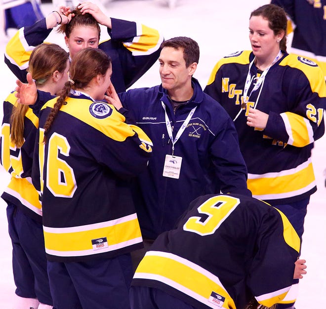 Notre Dame celebrates its first state championship in ice hockey over Wellesley , coach Jean-Yves Roy thanks his players for a great winning season.

Notre Dame Academy, Hingham captures the MIAA Division 2 state title in girls hockey on Sunday March 20, 2016. Greg Derr/ The Patriot Ledger.