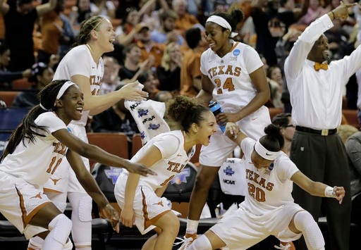 Texas players celebrate during a second-round women's college basketball game against Missouri in the NCAA Tournament, Monday, March 21, 2016, in Austin, Texas. Texas won 73-55.