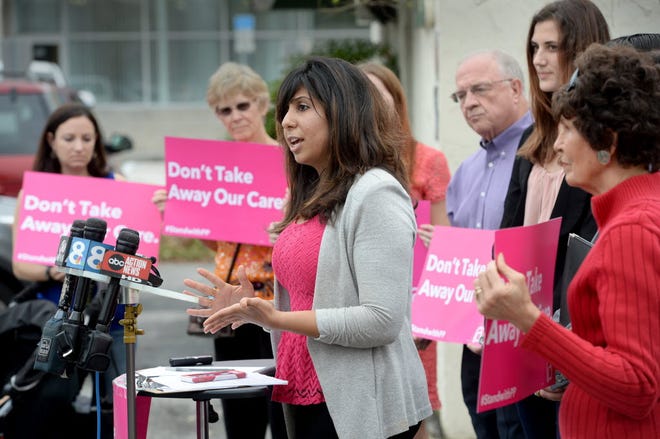 Anna Eskamani, director of public policy for Planned Parenthood of Southwest and Central Florida, speaks during a press conference to protest proposed bills sponsored by state Sen. Kelli Stargel and state Rep. Colleen Burton in front of Stargel's local office in Lakeland on Thursday Feb. 4, 2016.