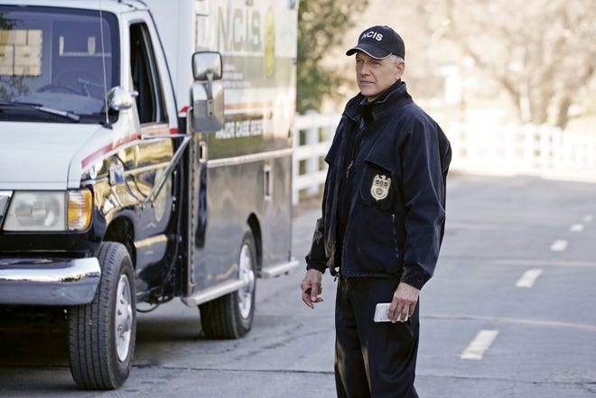 This image released by CBS shows Mark Harmon in a scene from "NCIS." CBS says it has renewed the series for two more seasons, and that series star and executive producer Mark Harmon has signed a new two-year deal of his own. "NCIS" premiered in 2003. During the 2009-2010 season, it clinched its status as TV's top-rated scripted drama series. (Jace Downs/CBS via AP)
