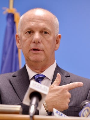 U.S. Attorney David J. Hickton speaks at a press conference at FBI Headquarters in Pittsburgh in this 2013 file photo.