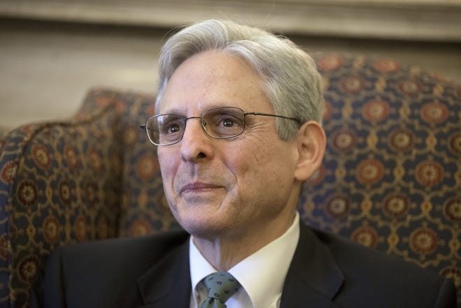 In this March 17, 2016, photo, Judge Merrick Garland, President Barack Obamaís choice to replace the late Justice Antonin Scalia on the Supreme Court, sits during a meeting with Sen. Patrick Leahy, D-Vt., on Capitol Hill in Washington. As Senate Republicans return home this week to tell voters why they are opposing President Barack Obama's Supreme Court nominee, seven have a bit more explaining to do. These GOP senators voted in 1997 to confirm nominee Merrick Garland to his current post on the appeals court. (AP Photo/J. Scott Applewhite)