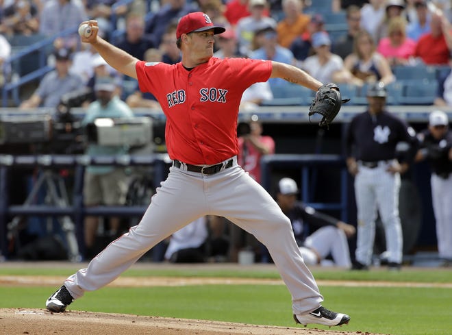 While no declaration has been made, Steven Wright (pictured) appears to be the favorite to start the season in the Red Sox' pitching rotation while Eduardo Rodriguez is on the disabled list.